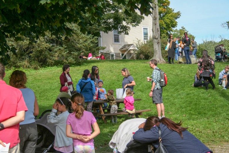 Families having a picnic  at Russels Orchad in Gloucester, MA.
