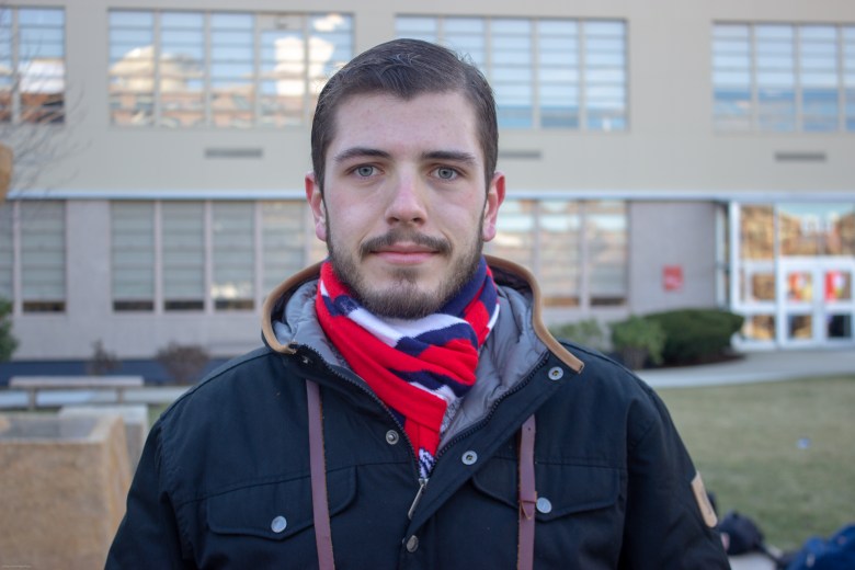 Joseph Suizzo posing for a portrait.